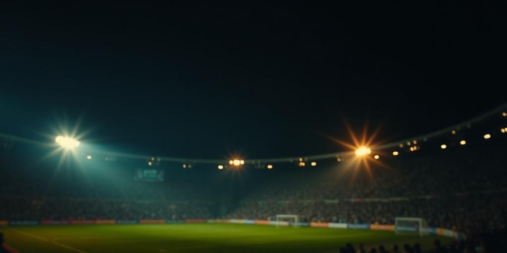Floodlit stadium at night